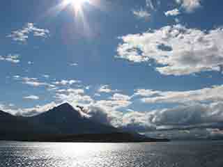 Hope shines over Bentsjordtinden (From Vikran-Larseng ferry, Norway)