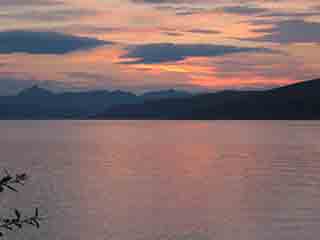 Mysterious pastel sunset over sound (From Kvaløya, Norway)