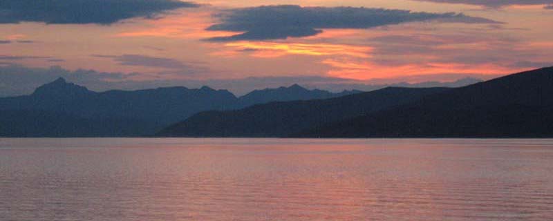 Mysterious pastel sunset over sound (From Kvaløya, Norway)