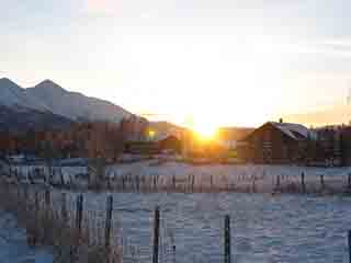 Last sunrise of 2007 over S.nes farm (Near Storsteinnes, Norway)