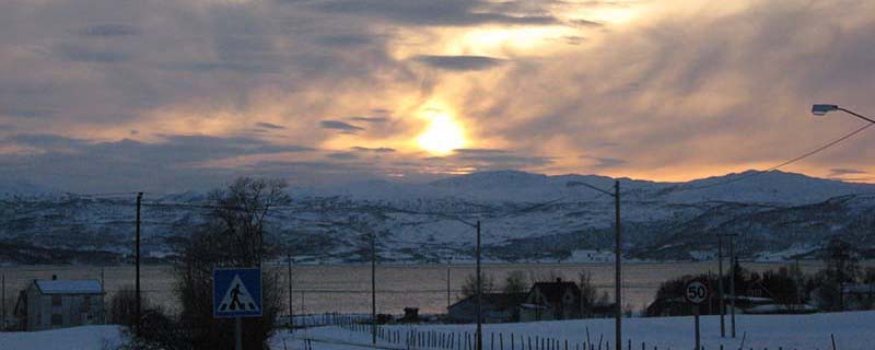 Divine veiled sunset watches over Sand (From Sand, Norway)