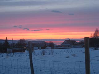 Banded-blanket sunset over Sand (with power line Photoshopped out) (Sand, Norway)