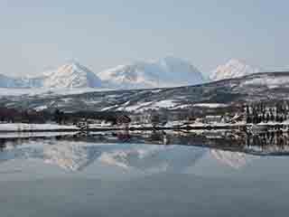 Sublime winter morning mirror fjord (Near Mestervik, Norway)