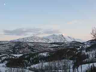 Moon stands vigil over sunlit peak 2 (From near Litjevatnet, Norway)