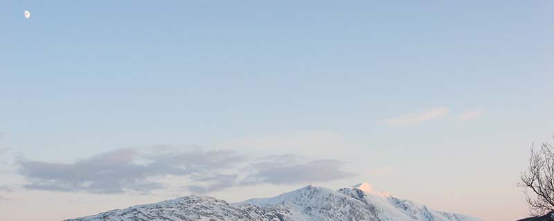 Moon stands vigil over sunlit peak 2 (From near Litjevatnet, Norway)