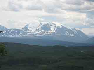 Mårfjell clothed in summer snowfields (From Mortenhalsskolten, Norway)