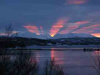 Trumpets of light over Nordfjorden (From near Mestervik, Norway)