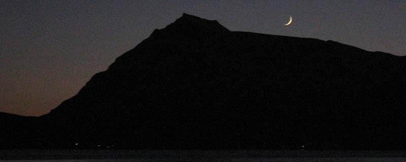 Crescent moon over Leirtinden (From Sand, Norway)