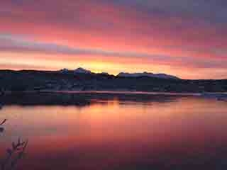 Crimson mirror sunrise over Nordfjorden (From Mestervik, Norway)