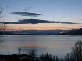 Low clouds over fjord in pastel sunset (From Sandsvika, Norway)