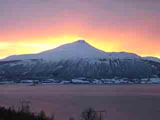 Lavafire sunset over Fugltinden (zoom) (From Bergneset, Norway)