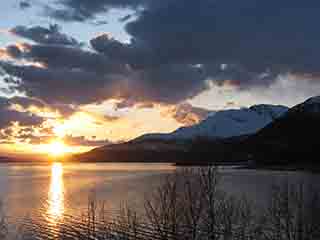 Evening Prayer video block image: Second Coming sunset over Kvaløya 1 (From near Sand, Norway)